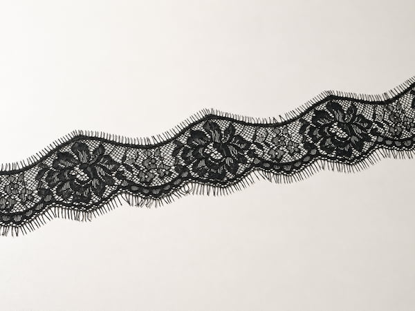 Chantilly lace trim with fine floral netting and soft eyelash edges.